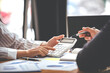 © Daenin - Team work with business analytic price chart on the table at the conference room.