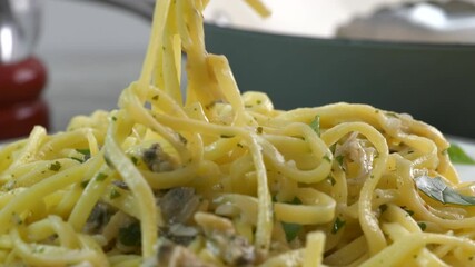 Poster - Taking a forkful of linguine with clam sauce very close up