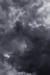 Wall Mural - Storm sky with dark gray black epic clouds background texture, hurricane with thunderstorm, cyclone. Black and white
