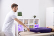 © Parilov - Doctor osteopath use muscle therapy sports massage for legs athlete woman after workout