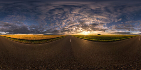 Wall Mural - hdri seamless spherical 360 panorama on asphalt road among fields in summer evening sunset with awesome clouds in equirectangular projection, ready for VR AR virtual reality