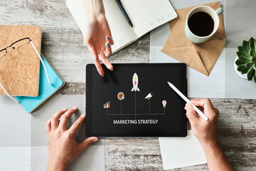 Wall Mural - marketing strategy diagram on device screen. business concept.