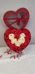 Sticker - Vertical shot of a heart-shaped box with roses