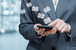 © natali_mis - Businesswoman is chatting by e-mail on a mobile device.