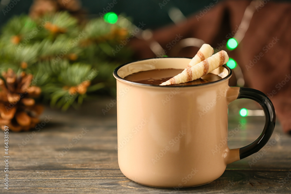 Mug of delicious hot chocolate on table