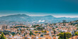 Urban panorama, aerial view, cityscape of Marseille, France. Sunny summer day with bright blue sky. Cityscape of Marseille, France. Urban background with sport Velodrome stadium. Stade Velodrome