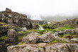 Dynjandi Fjallfoss.Tourists near Dynjandi waterfall also called the bride's veil and the most famous and beautiful of the Westfjords in Iceland.