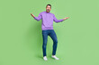 © deagreez - Full body photo of young excited man happy positive smile amazed surprised news isolated over green color background