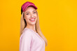 Profile side photo of young attractive girl happy positive smile wear baseball cap isolated over yellow color background
