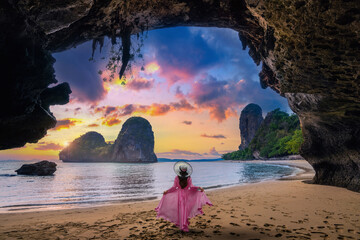 Wall Mural - Woman walking on Railay beach, Krabi in Thailand.