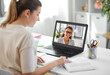© Syda Productions - education, school and distant learning concept - student woman with laptop computer having video call with female teacher at home