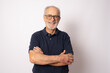 © Danko - Portrait of senior man with crossed arms isolated on white