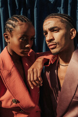 portrait of a couple in cornrows