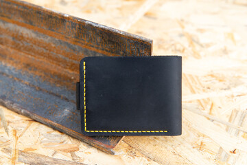 hand made leather wallet . Leather craft. Selective focus