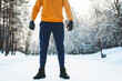 Young  jogger man during his workout in winter park