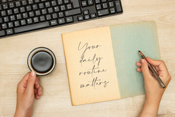 Wall Mural - Handwriting text writing Your Daily Routine Matters on old book