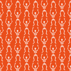 Wall Mural - Seamless pattern with white skeletons on a orange background . Halloween pattern