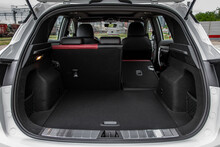 Huge, Clean And Empty Car Trunk In Interior Of Compact Suv. Rear View Of A SUV Car With Open Trunk
