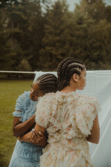 Wall Mural - sisters together in cornrows