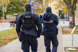 Fototapeta  - Polish police patrol on the street in the city