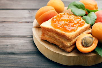 Sticker - Apricots and toast with jam on brown background