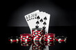 Poker game with royal flush combination. Chips and cards on black table. Successful and win