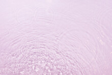 Pink Water Background With Splashing Water And Flowing Circles, Great Idea For Design.