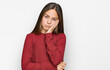 © Krakenimages.com - Beautiful brunette little girl wearing casual sweater thinking looking tired and bored with depression problems with crossed arms.
