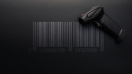 Barcode scanning. Reader laser scanner for warehouse. Retail label barcode scan on dark background. Warehouse inventory management.