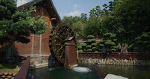 Water Wheel In Traditional Chinese Style Garden