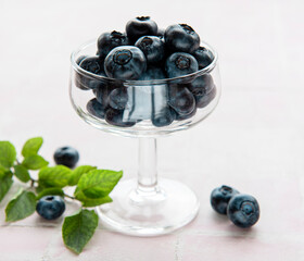 Wall Mural - Blueberries on tile background