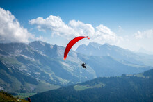 Paragliding Flight In The Mountains. Le Grand-Bornand, France