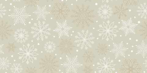 winter seamless background with snowflakes pattern. silver gold boho nautral baige christmas motif.