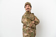 © luismolinero - Soldier man isolated on white background with arms crossed and happy