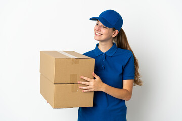 Wall Mural - Young delivery woman isolated on white background looking to the side and smiling