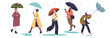Rainy autumn weather: people walk holding umbrellas under rain struggling with cold wind