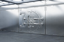 Side View Of Silver Sturdy Metal Bank Vault Door