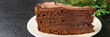 piece of chocolate cake cocoa sponge cake, chocolate ganache, brown cream sweet dessert ready to eat meal snack on the table copy space food background rustic. top view