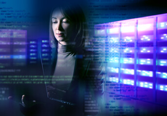 Woman system administrator. Girl on background of server room. Woman in data center. She sets up hosting equipment. Data storage and processing center. Programming code next to servers. Art blurred