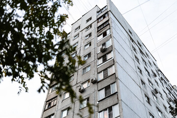 Wall Mural - bottom view of municipal residential multi-storey house in moscow city on overcast day