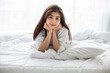 © tuiphotoengineer - Asian woman Beautiful young smiling woman sitting and sleeping in white bed and stretching in the morning at bedroom after waking up in her bed fully rested
