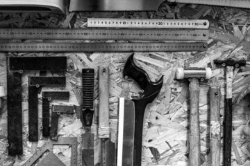 Wall Mural - Work tools A selection of carpentry tools hang in a workshop for woodwork