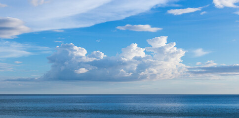Wall Mural - beautiful sky and clouds landscape, nature outdoors in summer at sea