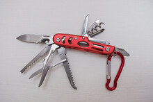 Swiss Army Knife On Red