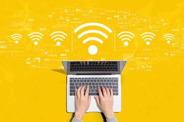 Poster - Wifi theme with person using a laptop computer
