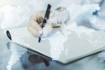 Poster - Double exposure of abstract digital world map and man hand writing in notebook on background, research and strategy concept