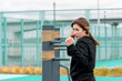 © Evgeny - young woman practicing martial arts alone on the sports ground
