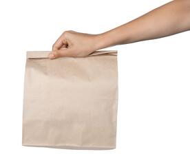 Wall Mural - Woman holding paper bag on white background, closeup