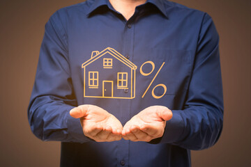 Poster - Businessperson hands holding abstract glowing house sketch on dark background. Real estate and mortgage concept.