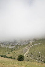 Thick White Fog Floating Over Valley InPicos De Europa Range